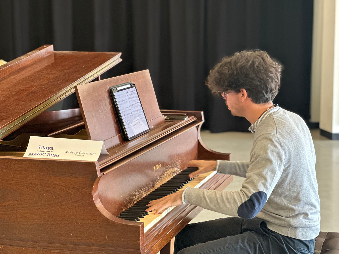Resident Artist Matteo Generani playing during the musical workshop for Maya and the Magic Ring