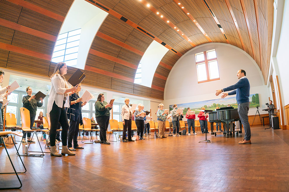 Paul Meier conducting the ensemble at Sing Most Anything, photo by Andrew Schwartz
