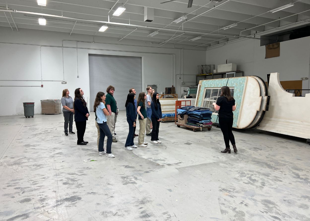Students on a tour of the Lyric Opera Production Center