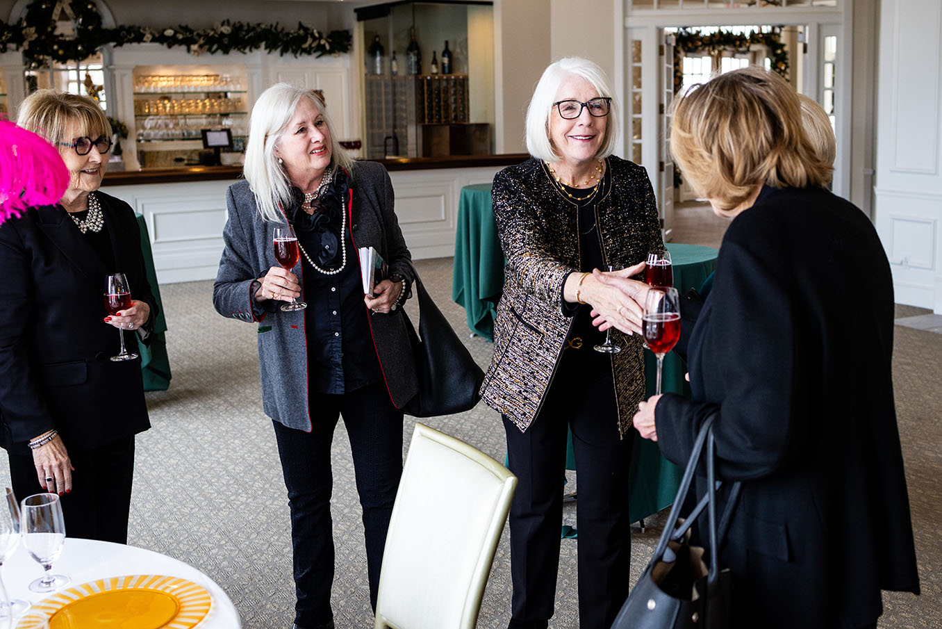Bev Leonard, Linn Gretzinger, Ann Bender, and Michelle Ritter at the 2025 Winter Luncheon, photo by David Riffel Photography